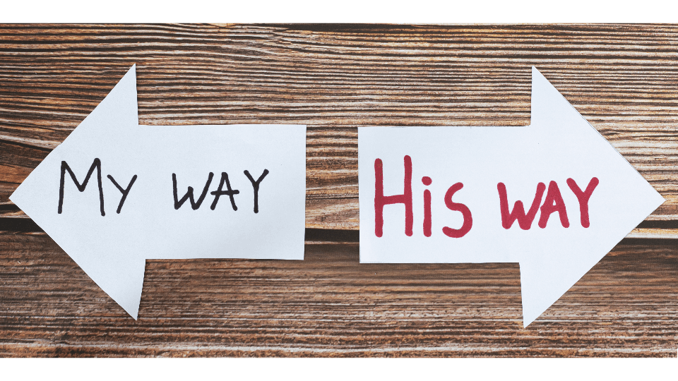 Two arrow-shaped papers on a wooden background, one pointing left labeled 'My Way' and one pointing right labeled 'His Way'.